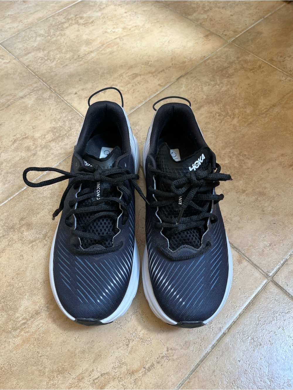 Hoka Black and White Running Sneakers